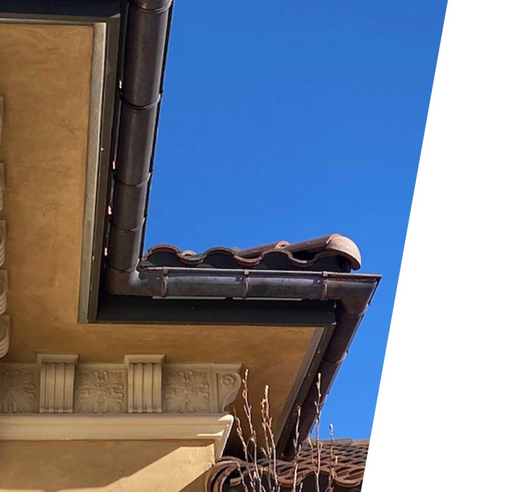 New copper gutters installed by Precision Seamless Gutters