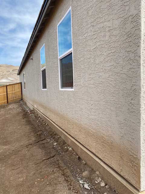 Stucco coming off house due to no gutters